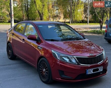 Червоний Кіа Ріо, об'ємом двигуна 1.4 л та пробігом 190 тис. км за 5999 $, фото 1 на Automoto.ua