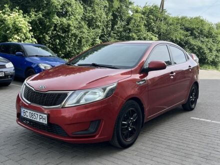 Красный Киа Рио, объемом двигателя 1.4 л и пробегом 220 тыс. км за 5700 $, фото 1 на Automoto.ua