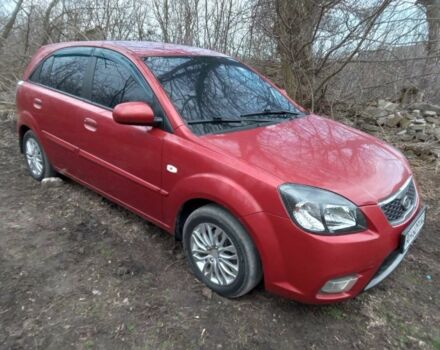 Красный Киа Рио, объемом двигателя 1.4 л и пробегом 159 тыс. км за 4500 $, фото 1 на Automoto.ua
