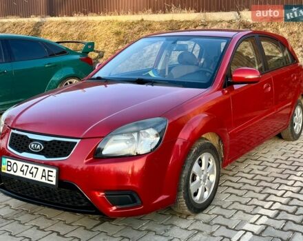 Червоний Кіа Ріо, об'ємом двигуна 1.4 л та пробігом 171 тис. км за 5700 $, фото 1 на Automoto.ua