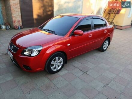 Червоний Кіа Ріо, об'ємом двигуна 1.4 л та пробігом 68 тис. км за 6500 $, фото 1 на Automoto.ua