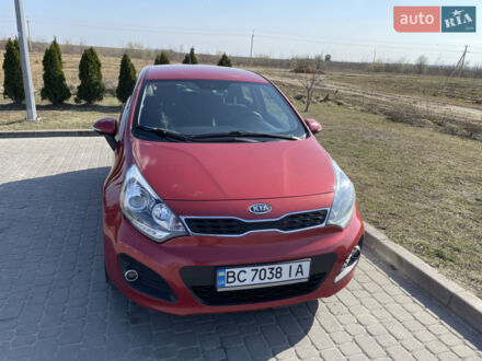 Красный Киа Рио, объемом двигателя 1.4 л и пробегом 209 тыс. км за 6000 $, фото 1 на Automoto.ua