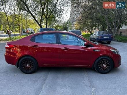 Красный Киа Рио, объемом двигателя 1.4 л и пробегом 190 тыс. км за 5999 $, фото 1 на Automoto.ua