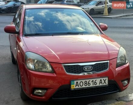 Красный Киа Рио, объемом двигателя 1.4 л и пробегом 198 тыс. км за 7500 $, фото 1 на Automoto.ua