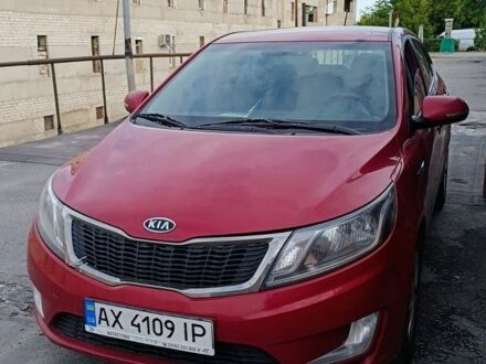 Красный Киа Рио, объемом двигателя 1.59 л и пробегом 272 тыс. км за 5800 $, фото 1 на Automoto.ua