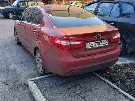 Красный Киа Рио, объемом двигателя 1.4 л и пробегом 140 тыс. км за 9500 $, фото 1 на Automoto.ua