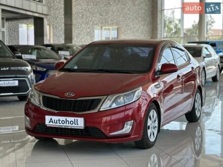 Красный Киа Рио, объемом двигателя 1.4 л и пробегом 253 тыс. км за 6490 $, фото 1 на Automoto.ua