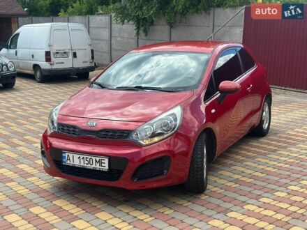 Червоний Кіа Ріо, об'ємом двигуна 1.12 л та пробігом 240 тис. км за 4700 $, фото 1 на Automoto.ua