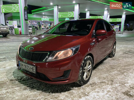 Красный Киа Рио, объемом двигателя 1.4 л и пробегом 163 тыс. км за 5600 $, фото 1 на Automoto.ua