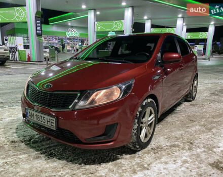 Червоний Кіа Ріо, об'ємом двигуна 1.4 л та пробігом 163 тис. км за 5600 $, фото 1 на Automoto.ua
