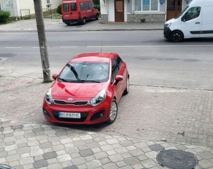 Красный Киа Рио, объемом двигателя 1.4 л и пробегом 145 тыс. км за 7000 $, фото 1 на Automoto.ua