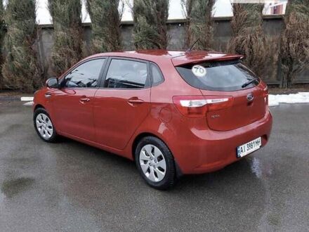 Красный Киа Рио, объемом двигателя 1.4 л и пробегом 181 тыс. км за 6800 $, фото 1 на Automoto.ua