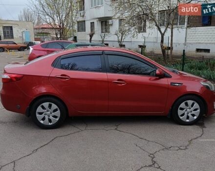 Червоний Кіа Ріо, об'ємом двигуна 1.4 л та пробігом 252 тис. км за 7000 $, фото 1 на Automoto.ua