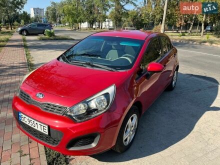 Червоний Кіа Ріо, об'ємом двигуна 1.6 л та пробігом 137 тис. км за 7800 $, фото 1 на Automoto.ua