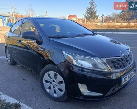 Червоний Кіа Ріо, об'ємом двигуна 1.4 л та пробігом 225 тис. км за 5950 $, фото 1 на Automoto.ua