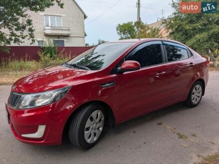 Червоний Кіа Ріо, об'ємом двигуна 1.4 л та пробігом 181 тис. км за 6800 $, фото 1 на Automoto.ua