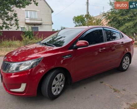 Красный Киа Рио, объемом двигателя 1.4 л и пробегом 181 тыс. км за 6800 $, фото 1 на Automoto.ua