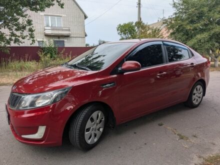 Красный Киа Рио, объемом двигателя 1.4 л и пробегом 181 тыс. км за 6822 $, фото 1 на Automoto.ua