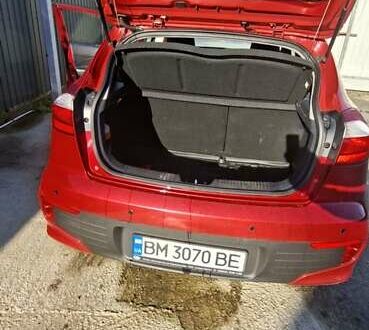 Красный Киа Рио, объемом двигателя 1.4 л и пробегом 104 тыс. км за 9500 $, фото 1 на Automoto.ua