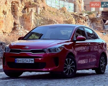 Красный Киа Рио, объемом двигателя 1.59 л и пробегом 80 тыс. км за 11400 $, фото 1 на Automoto.ua