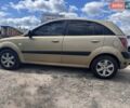 Желтый Киа Рио, объемом двигателя 1.4 л и пробегом 336 тыс. км за 3600 $, фото 1 на Automoto.ua
