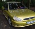 Желтый Киа Рио, объемом двигателя 1.34 л и пробегом 257 тыс. км за 1400 $, фото 1 на Automoto.ua