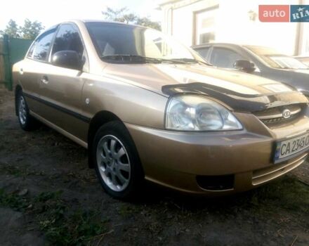 Желтый Киа Рио, объемом двигателя 1.3 л и пробегом 150 тыс. км за 3950 $, фото 1 на Automoto.ua