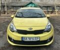 Желтый Киа Рио, объемом двигателя 1.6 л и пробегом 145 тыс. км за 8800 $, фото 4 на Automoto.ua