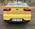 Желтый Киа Рио, объемом двигателя 1.6 л и пробегом 140 тыс. км за 8700 $, фото 5 на Automoto.ua