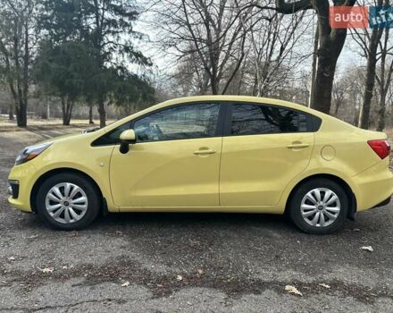 Жовтий Кіа Ріо, об'ємом двигуна 1.6 л та пробігом 140 тис. км за 8700 $, фото 10 на Automoto.ua
