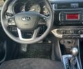 Желтый Киа Рио, объемом двигателя 1.6 л и пробегом 140 тыс. км за 8700 $, фото 8 на Automoto.ua