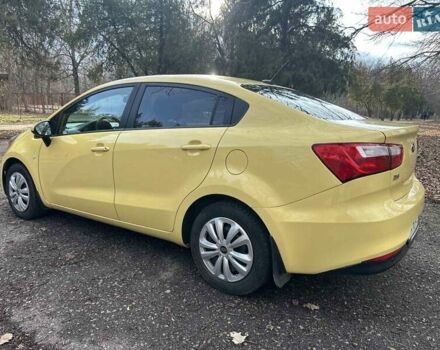 Жовтий Кіа Ріо, об'ємом двигуна 1.59 л та пробігом 140 тис. км за 8999 $, фото 6 на Automoto.ua