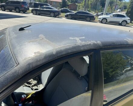Жовтий Кіа Ріо, об'ємом двигуна 1.5 л та пробігом 150 тис. км за 1350 $, фото 7 на Automoto.ua