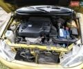 Желтый Киа Рио, объемом двигателя 1.5 л и пробегом 147 тыс. км за 1800 $, фото 1 на Automoto.ua