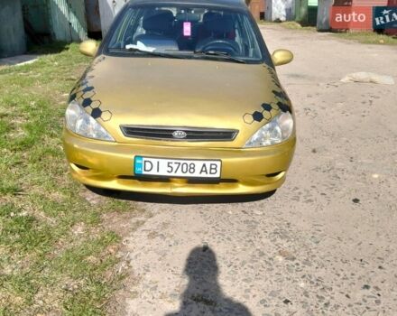 Желтый Киа Рио, объемом двигателя 1.5 л и пробегом 147 тыс. км за 1800 $, фото 2 на Automoto.ua