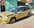 Желтый Киа Рио, объемом двигателя 1.5 л и пробегом 147 тыс. км за 1800 $, фото 1 на Automoto.ua