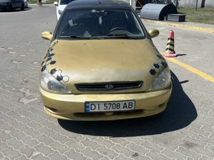 Жовтий Кіа Ріо, об'ємом двигуна 1.5 л та пробігом 150 тис. км за 1350 $, фото 1 на Automoto.ua