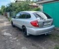 Серый Киа Рио, объемом двигателя 1.4 л и пробегом 417 тыс. км за 1500 $, фото 3 на Automoto.ua