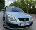 Серый Киа Рио, объемом двигателя 1.4 л и пробегом 230 тыс. км за 3800 $, фото 1 на Automoto.ua
