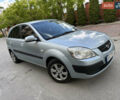Серый Киа Рио, объемом двигателя 1.4 л и пробегом 230 тыс. км за 3800 $, фото 2 на Automoto.ua