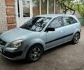 Серый Киа Рио, объемом двигателя 1.4 л и пробегом 210 тыс. км за 4600 $, фото 1 на Automoto.ua