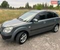 Серый Киа Рио, объемом двигателя 1.4 л и пробегом 245 тыс. км за 4200 $, фото 6 на Automoto.ua