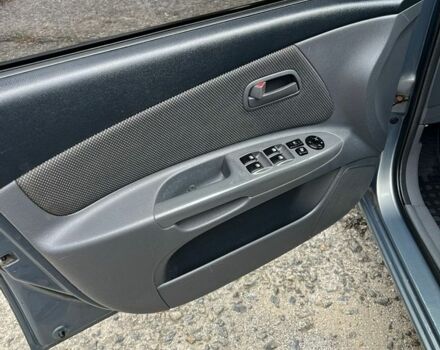 Серый Киа Рио, объемом двигателя 1.4 л и пробегом 245 тыс. км за 4200 $, фото 13 на Automoto.ua