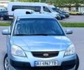 Серый Киа Рио, объемом двигателя 1.4 л и пробегом 220 тыс. км за 6499 $, фото 1 на Automoto.ua