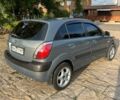 Серый Киа Рио, объемом двигателя 1.4 л и пробегом 245 тыс. км за 4200 $, фото 1 на Automoto.ua