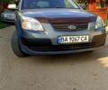 Серый Киа Рио, объемом двигателя 1.4 л и пробегом 194 тыс. км за 6500 $, фото 1 на Automoto.ua