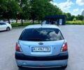Серый Киа Рио, объемом двигателя 1.4 л и пробегом 220 тыс. км за 6499 $, фото 3 на Automoto.ua