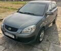 Серый Киа Рио, объемом двигателя 1.4 л и пробегом 245 тыс. км за 4200 $, фото 2 на Automoto.ua
