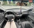 Сірий Кіа Ріо, об'ємом двигуна 1.4 л та пробігом 290 тис. км за 5006 $, фото 5 на Automoto.ua