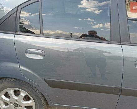 Сірий Кіа Ріо, об'ємом двигуна 1.4 л та пробігом 194 тис. км за 5850 $, фото 7 на Automoto.ua